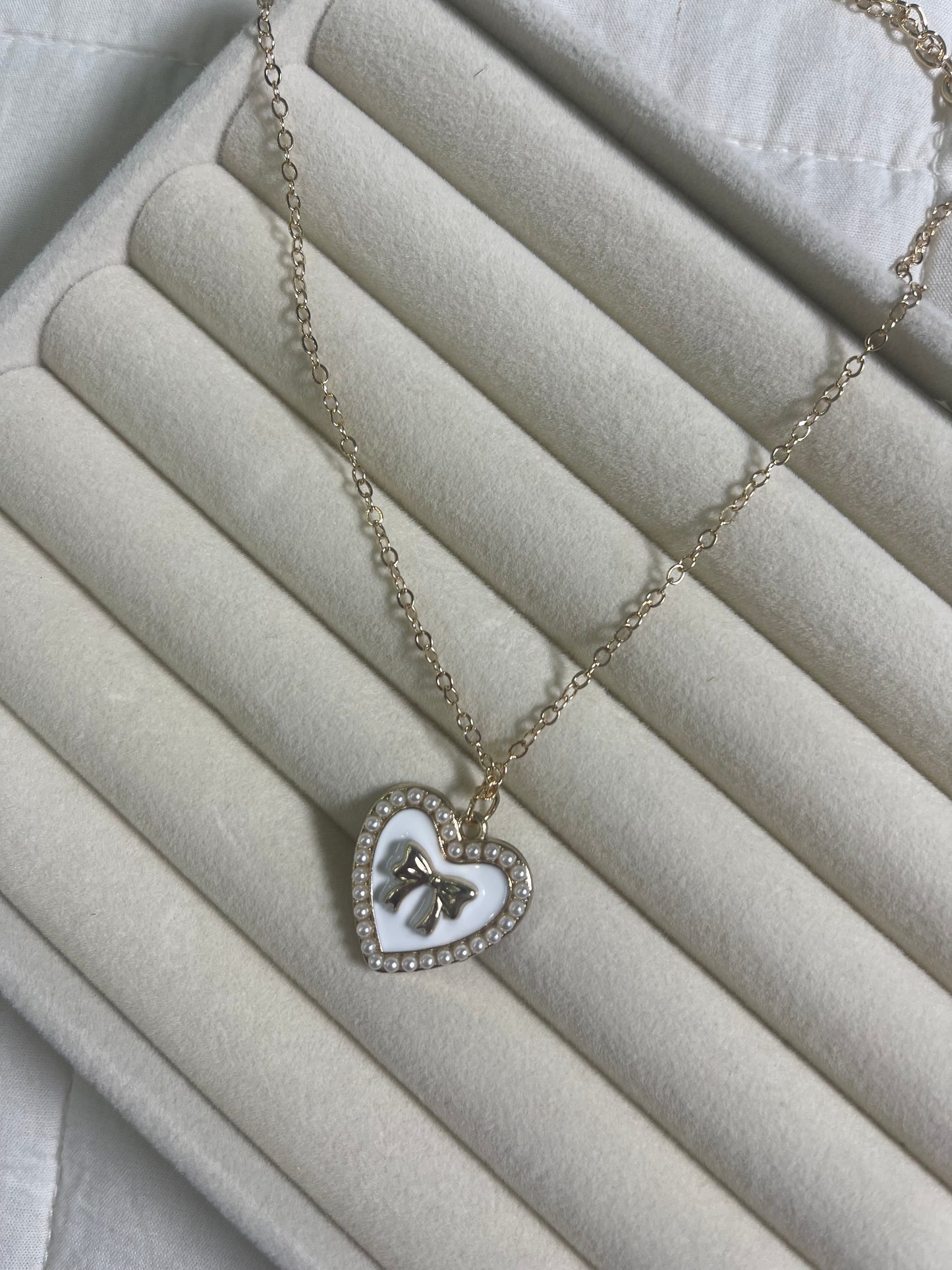 Bow and heart necklace